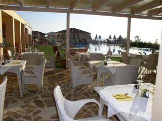 astra village hotel suites