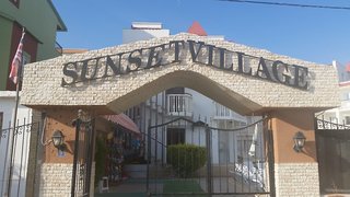 sunset village apart hotel