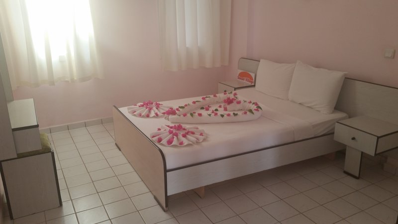 sunset village apart hotel