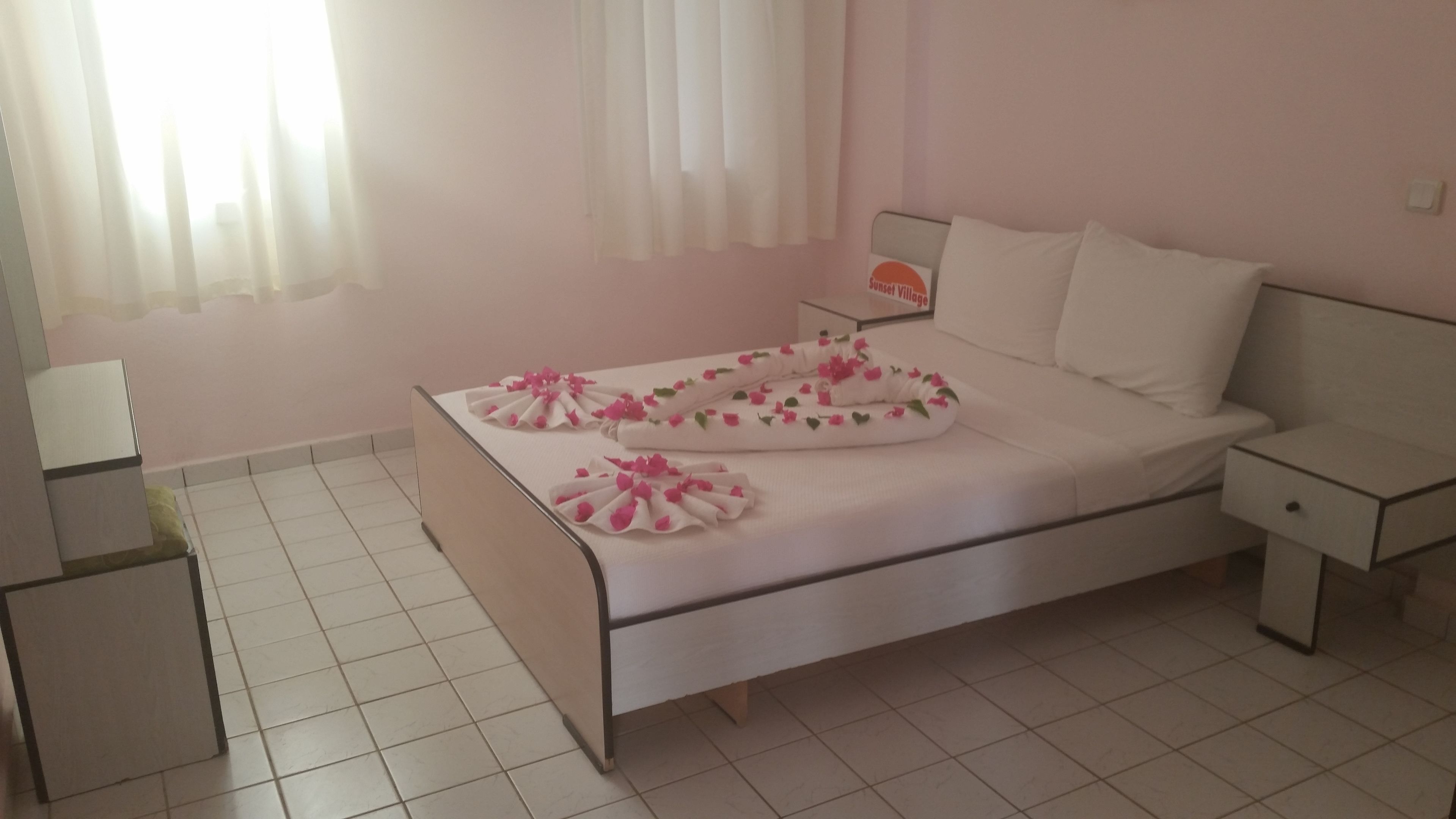 sunset village apart hotel