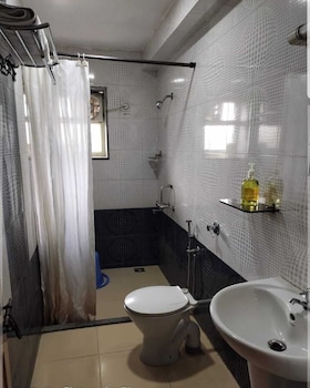 sharada international hotel