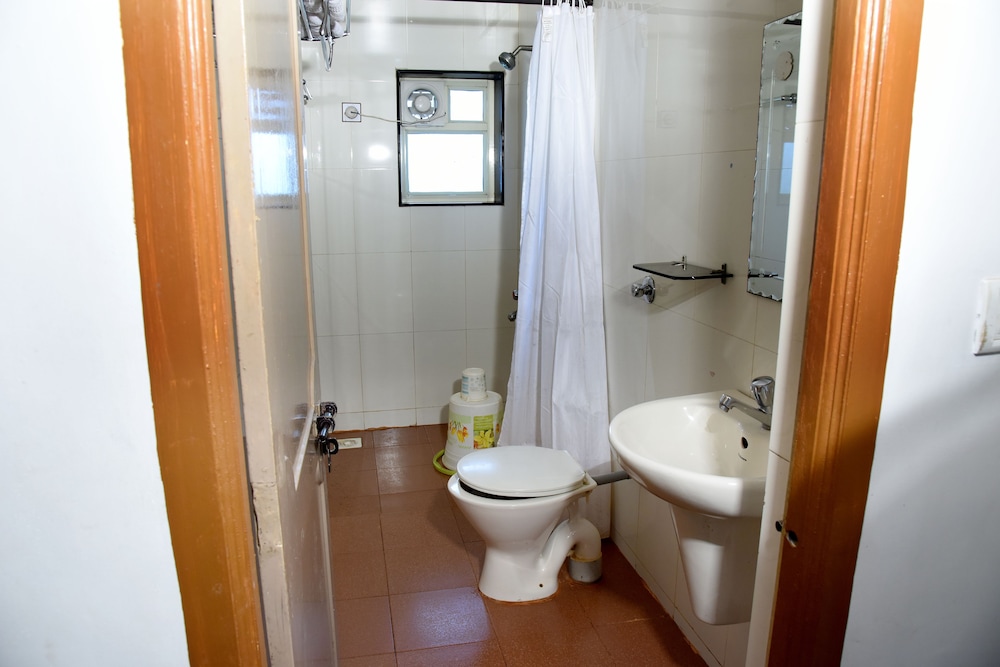 sharada international hotel