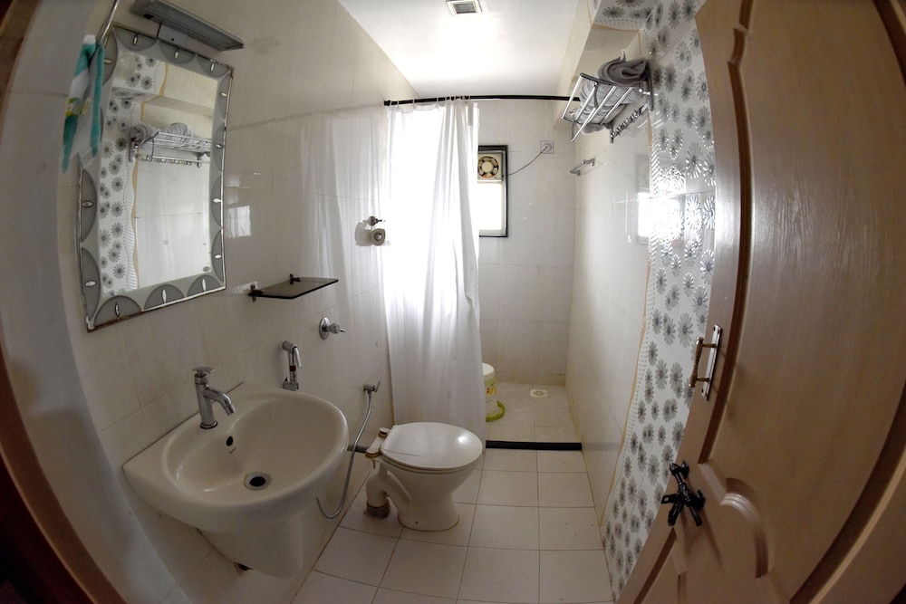sharada international hotel