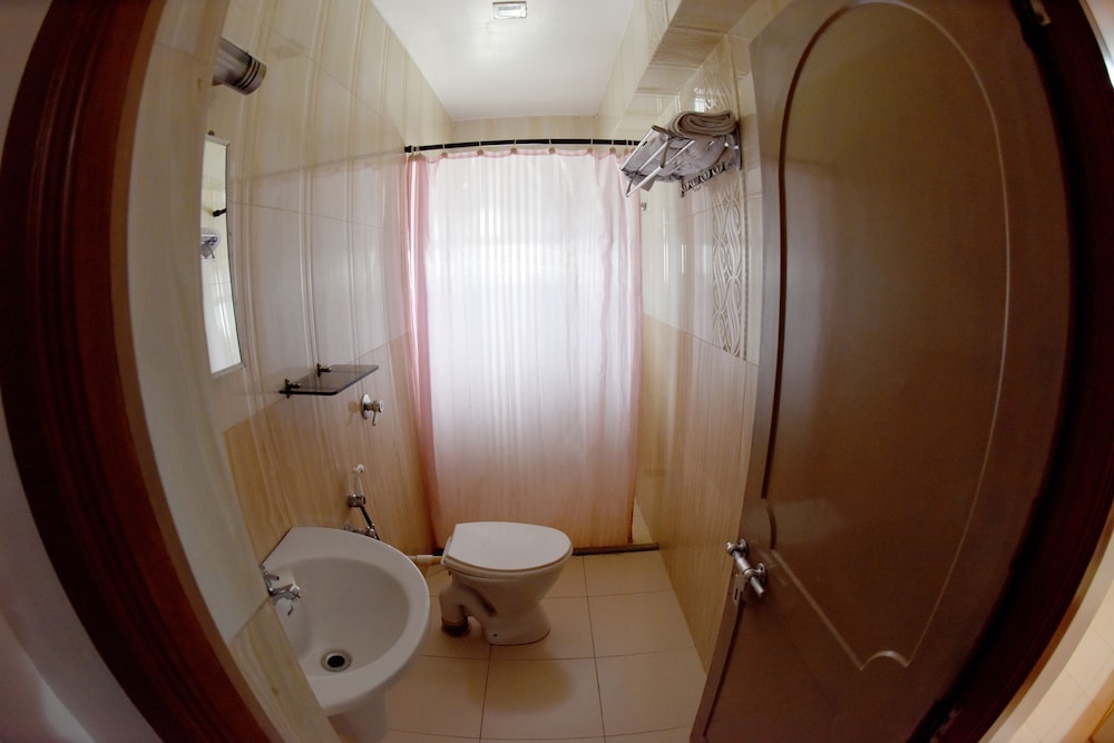 sharada international hotel