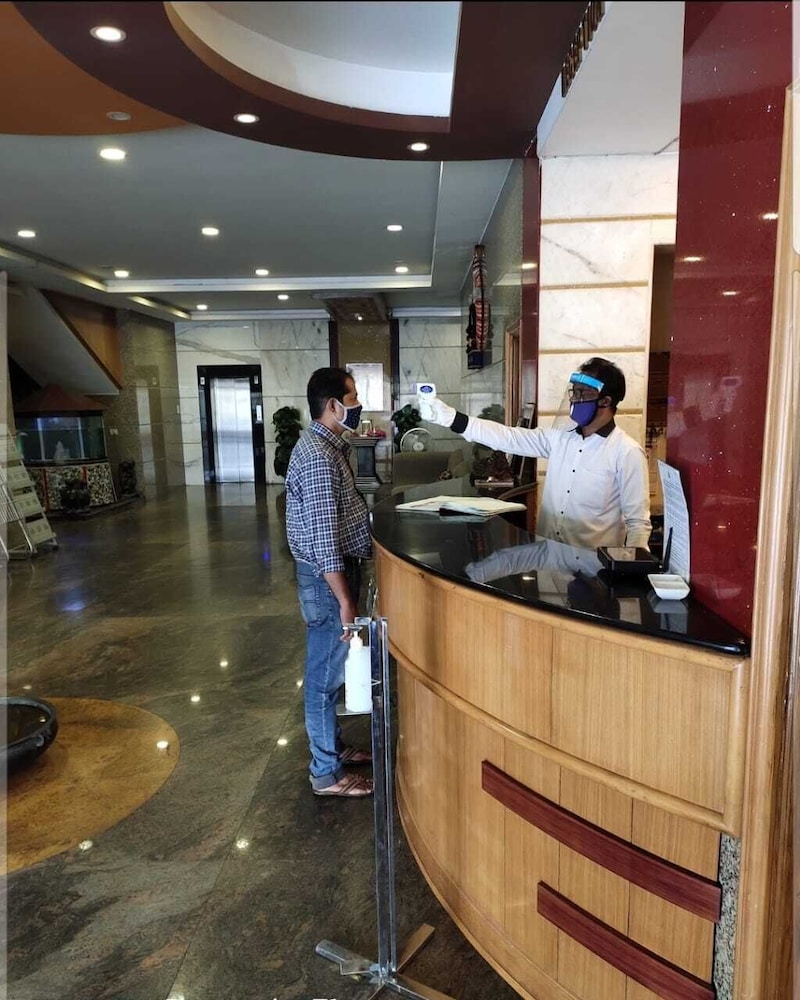 sharada international hotel