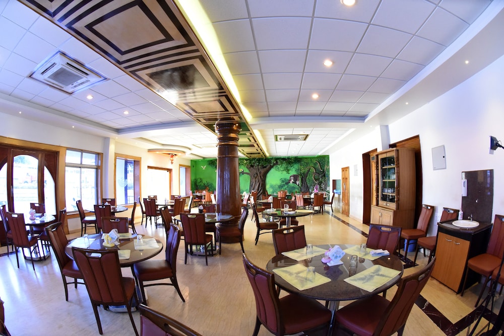 sharada international hotel