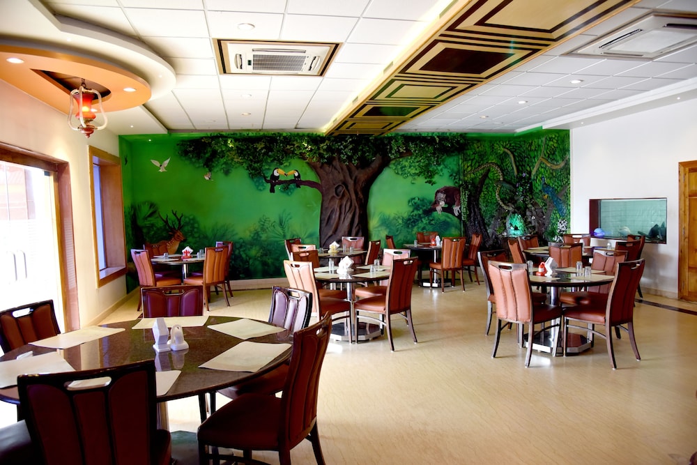 sharada international hotel