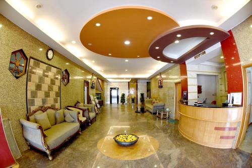sharada international hotel