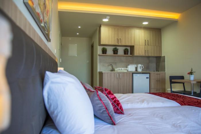 zodiac hotel apartments