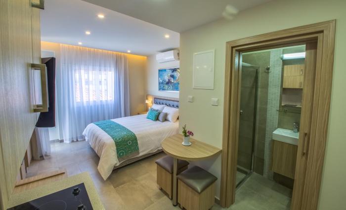 zodiac hotel apartments