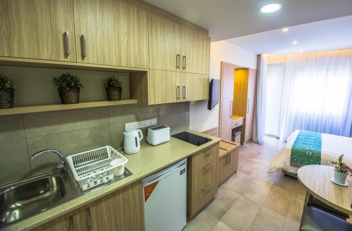 zodiac hotel apartments