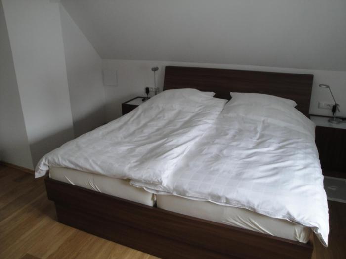 bed and kitchen burgau