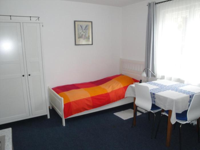 bed and kitchen burgau