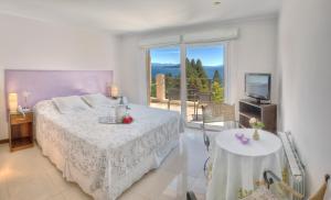 Nbh Lacus Boutique Hotel,San Carlos De Bariloche>>Playa Bonita,4 star