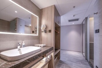 atour hotel international trade city yiwu