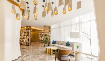 atour hotel international trade city yiwu