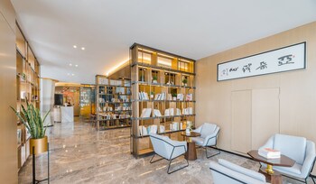 atour hotel international trade city yiwu