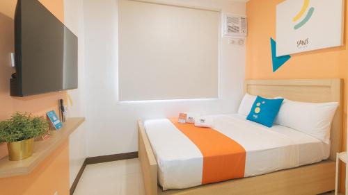 sans hotel at one jd place makati by reddoorz