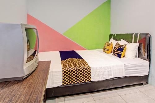 spot on 92531 pacar guesthouse