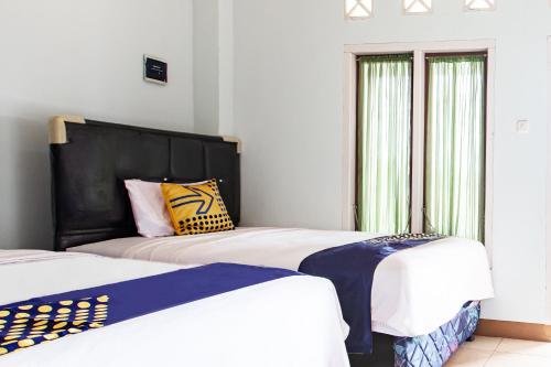 spot on 93430 delta bnb residence syariah