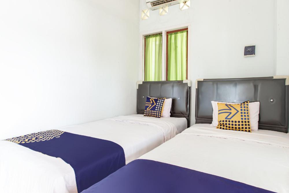 spot on 93430 delta bnb residence syariah