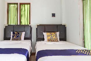 spot on 93430 delta bnb residence syariah
