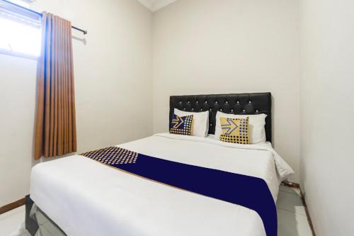 spot on 93555 triple n homestay