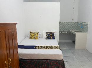 spot on 93555 triple n homestay