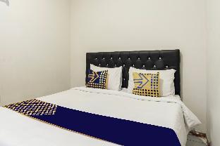 spot on 93555 triple n homestay