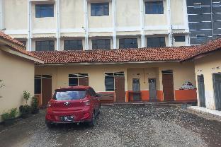 spot on 93988 guest house wijaya syariah