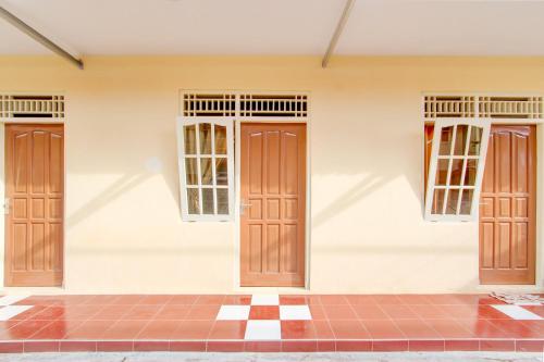 spot on 93988 guest house wijaya syariah