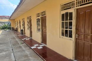 spot on 93988 guest house wijaya syariah