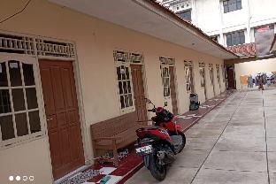 spot on 93988 guest house wijaya syariah