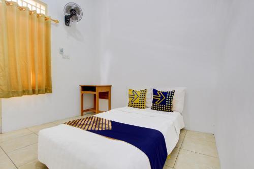 spot on 93988 guest house wijaya syariah