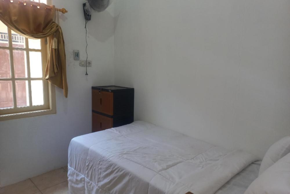 spot on 93988 guest house wijaya syariah