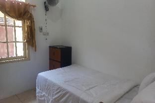 spot on 93988 guest house wijaya syariah