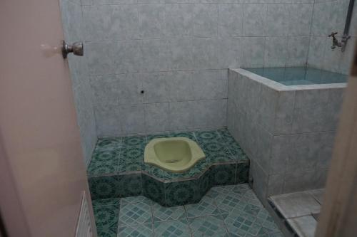 spot on 92665 yoko kost syariah