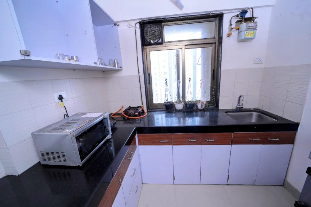 classy 1 bhk near viviana mall with parking