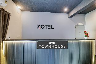 super townhouse ecity inn