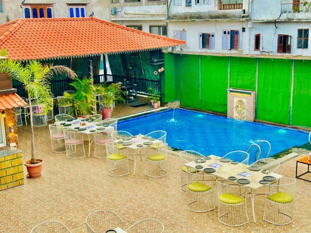hotel grand udaipur rooftop cafe swimming pool