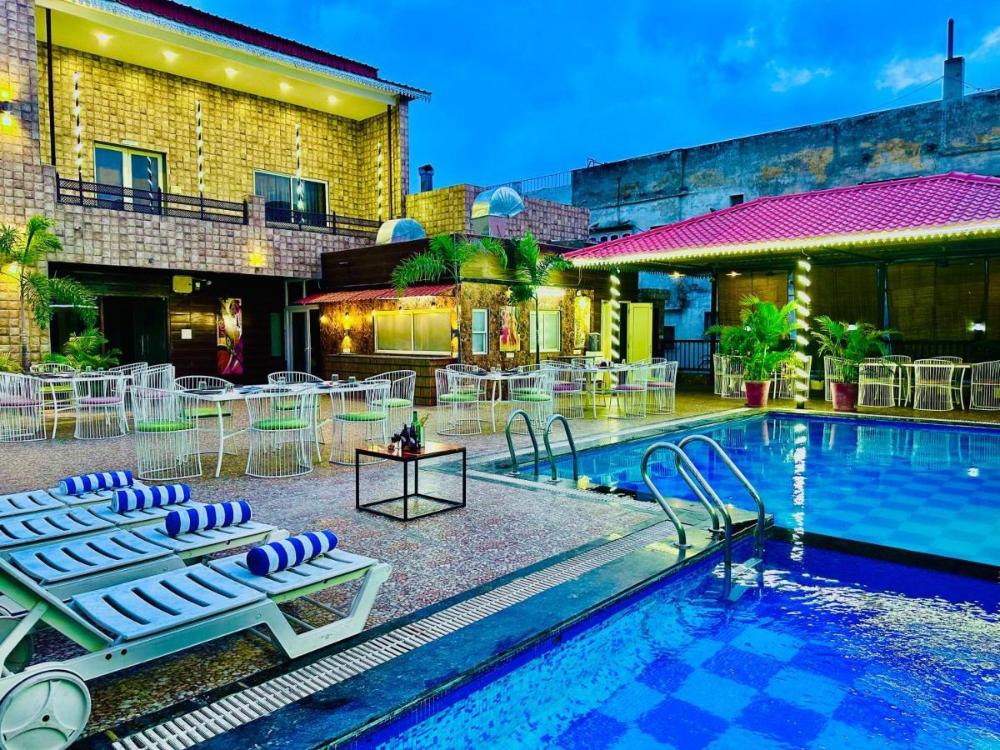hotel grand udaipur rooftop cafe swimming pool