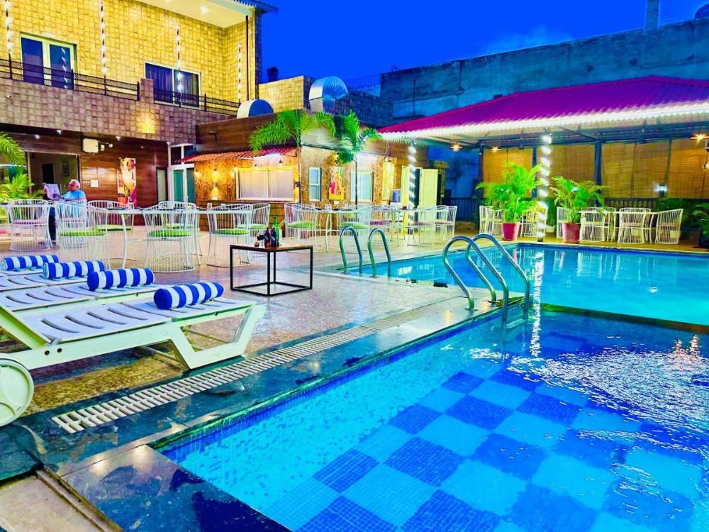 hotel grand udaipur rooftop cafe swimming pool