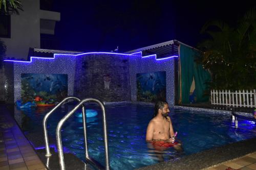 coastal bay inn by green apple stays