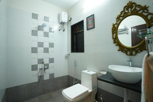 coastal bay inn by green apple stays