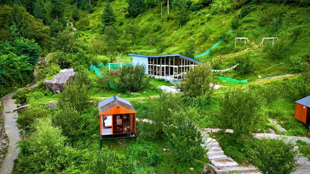 glass cabins and cafe by urban monk