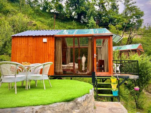 glass cabins and cafe by urban monk