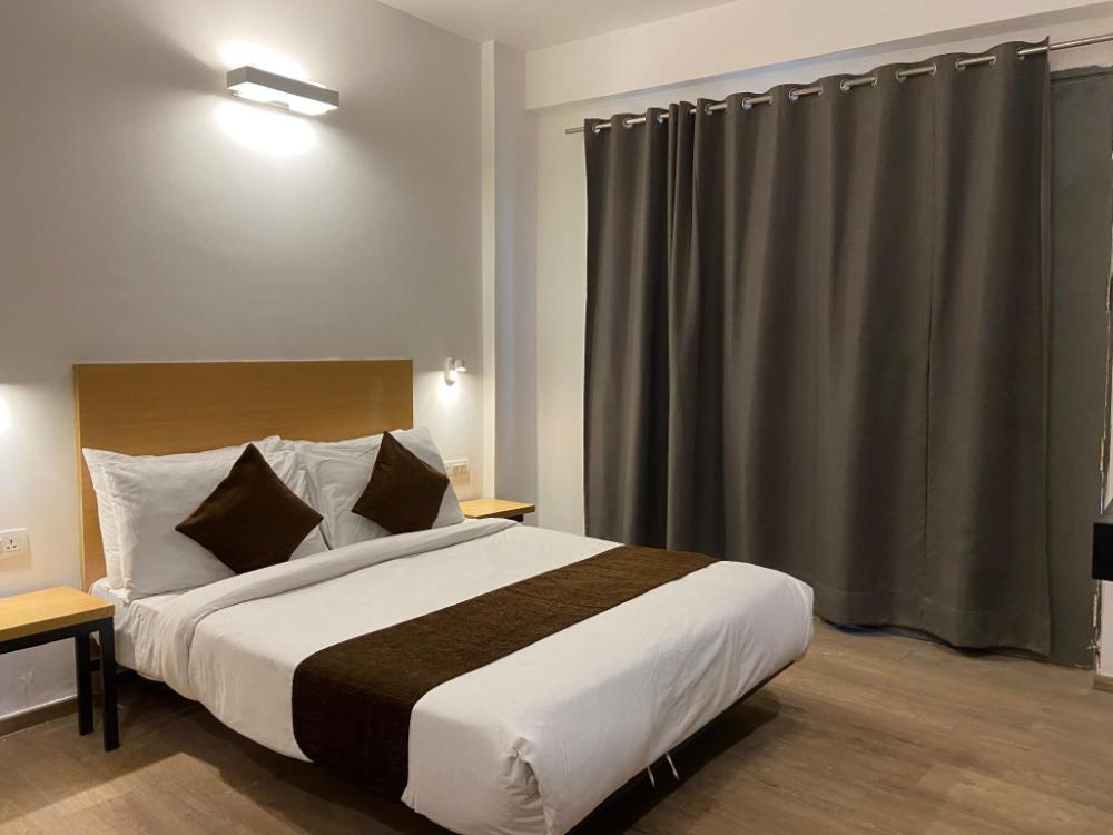 hotel crown omaxe the forest spa view