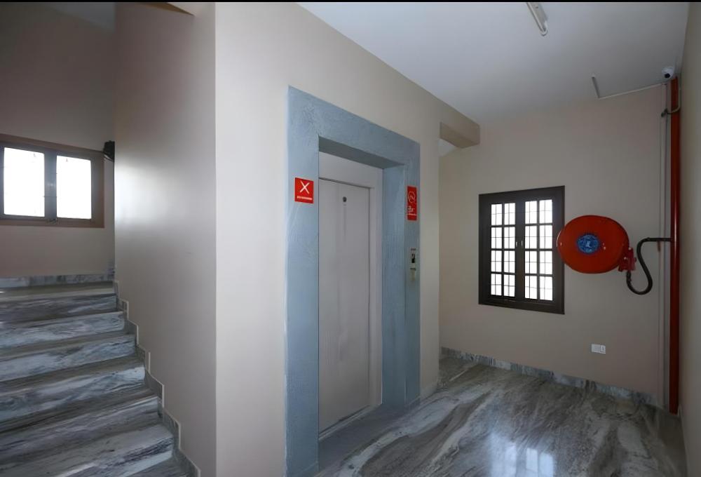 white house villa close to rock beach