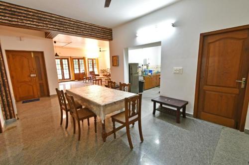 white house villa close to rock beach