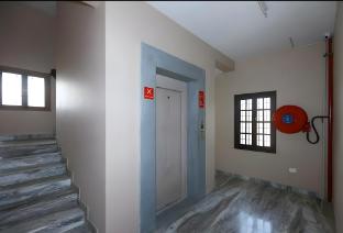 white house villa close to rock beach